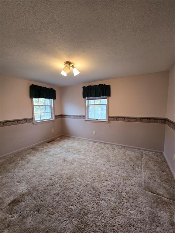 205 Hamburg Road Greenville, PA 16125 - Photo 28 of 39 a view of wooden floor and windows in a room