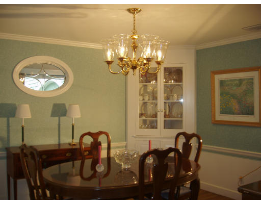 54 Alba Road Wellesley, MA 02481 - Photo 3 of 14 a view of a dining room with furniture and chandelier