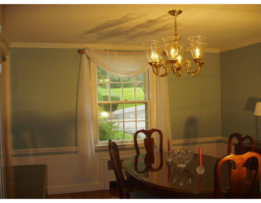 54 Alba Road Wellesley, MA 02481 - Photo 4 of 14 a view of a dining room with furniture and chandelier