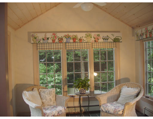 54 Alba Road Wellesley, MA 02481 - Photo 5 of 14 a living room with furniture and floor to ceiling window