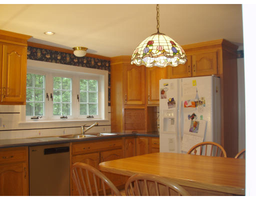 54 Alba Road Wellesley, MA 02481 - Photo 7 of 14 a bathroom with a sink mirror and a large window