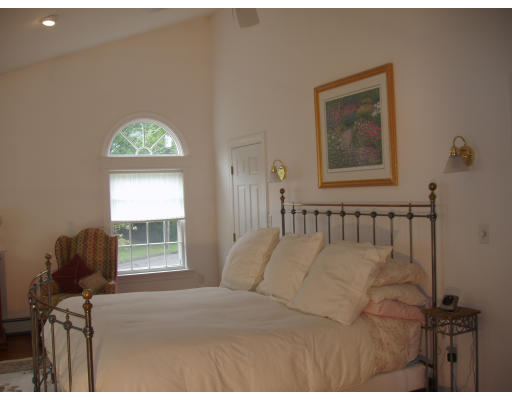 54 Alba Road Wellesley, MA 02481 - Photo 8 of 14 a bedroom with a bed and a window