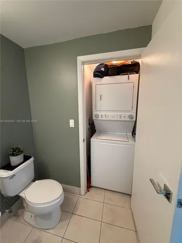 a bathroom with a toilet and a sink