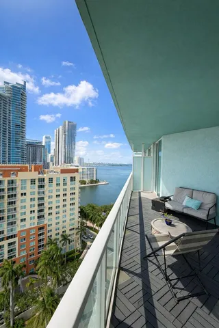 a balcony with a city view
