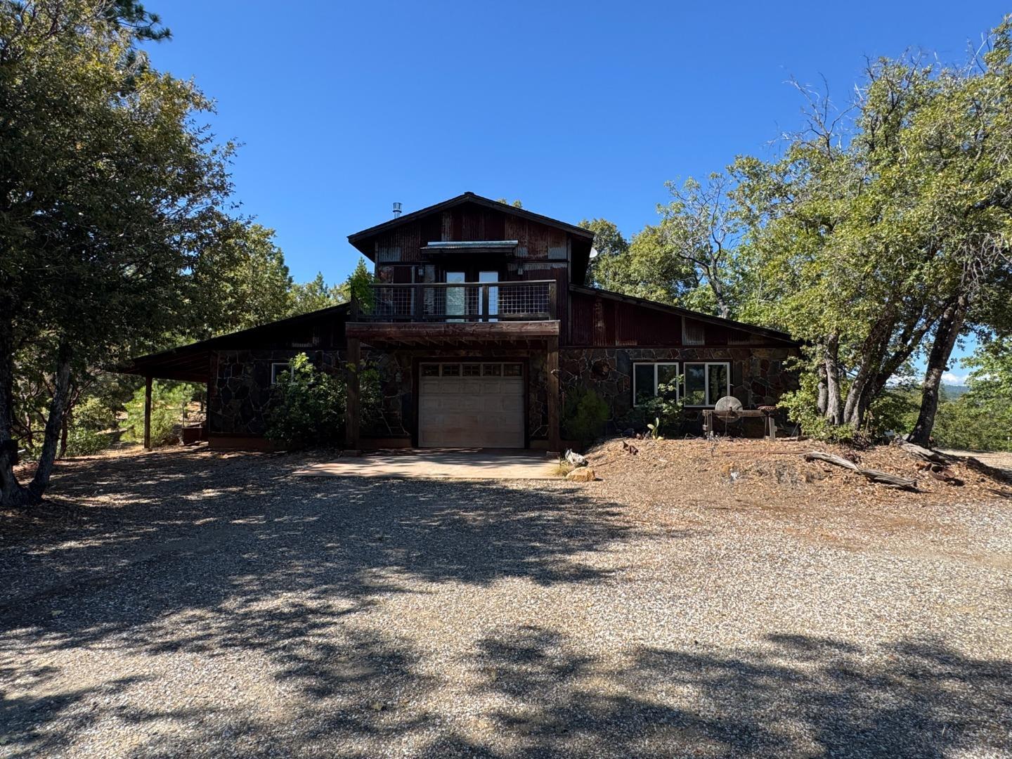 2251 Folendorf Road Murphys, CA 95247 - Photo 28 of 39 a front view of a house with a yard