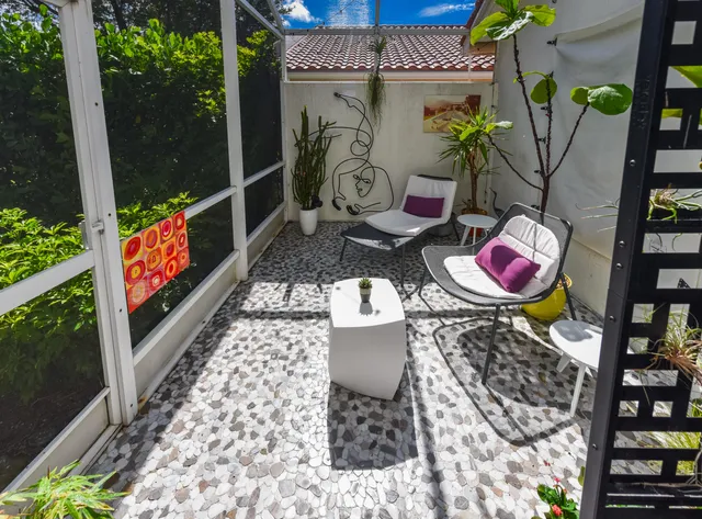 a view of a house with a garden