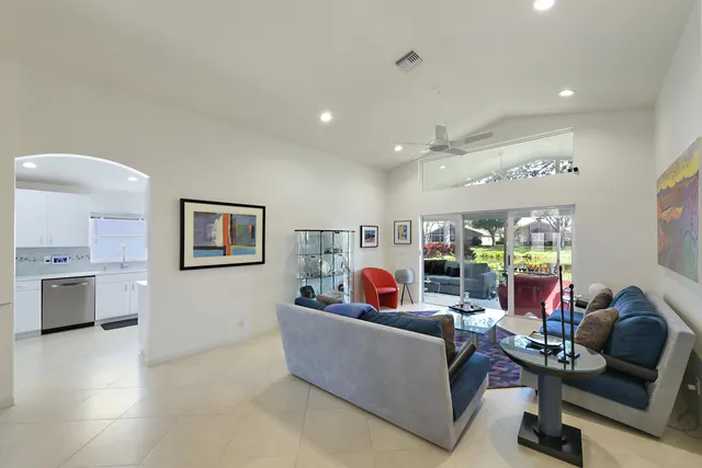 a kitchen with a sink a stove and refrigerator