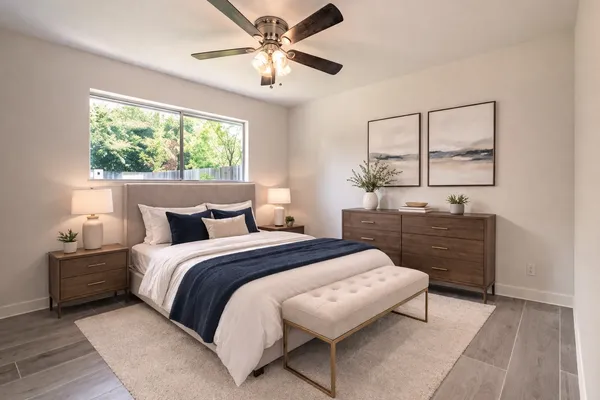 a bedroom with a bed and a dresser