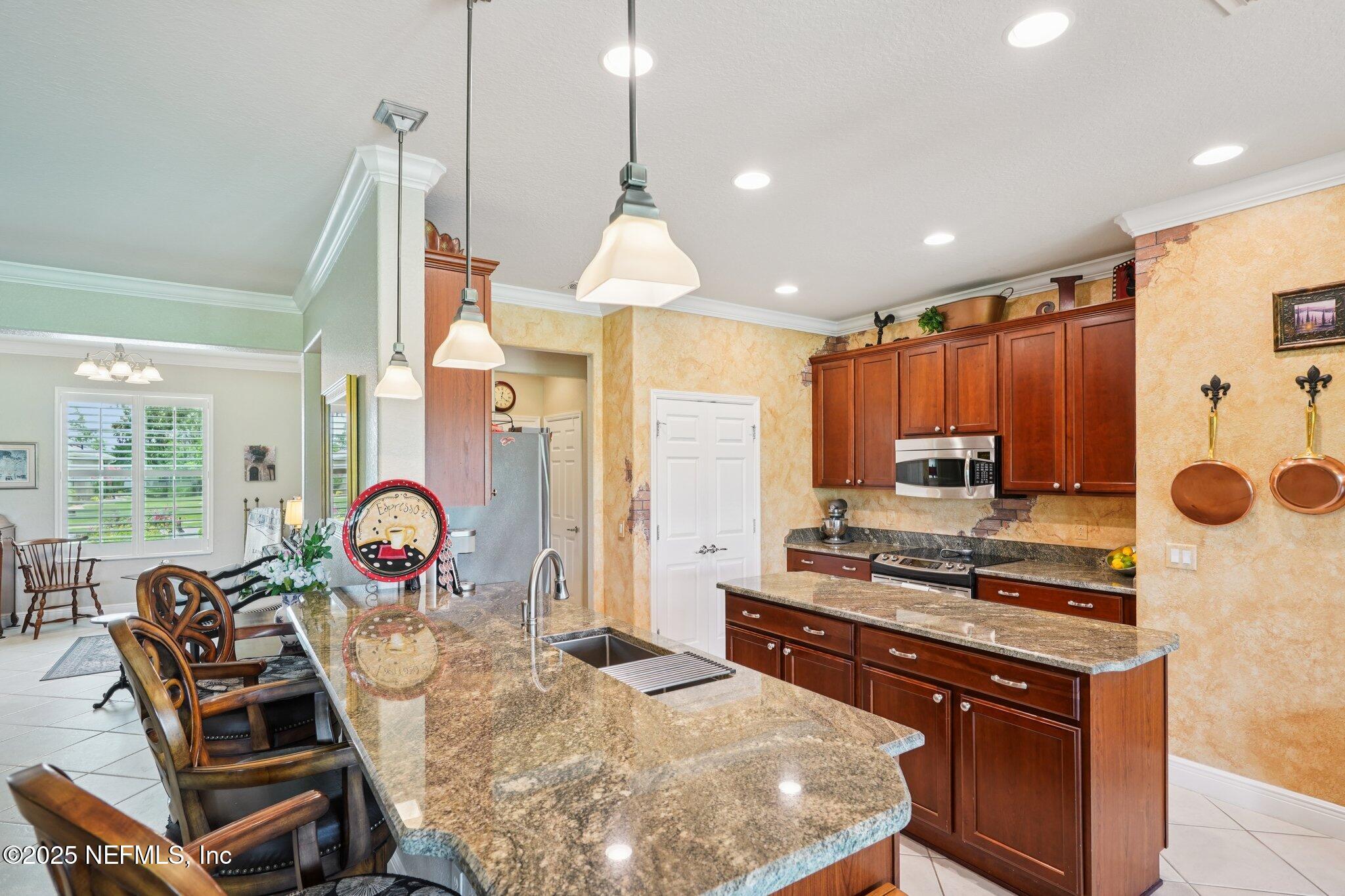 9839 Southwest 63rd Loop Ocala, FL 34481 - Photo 6 of 43 Expansive counter space