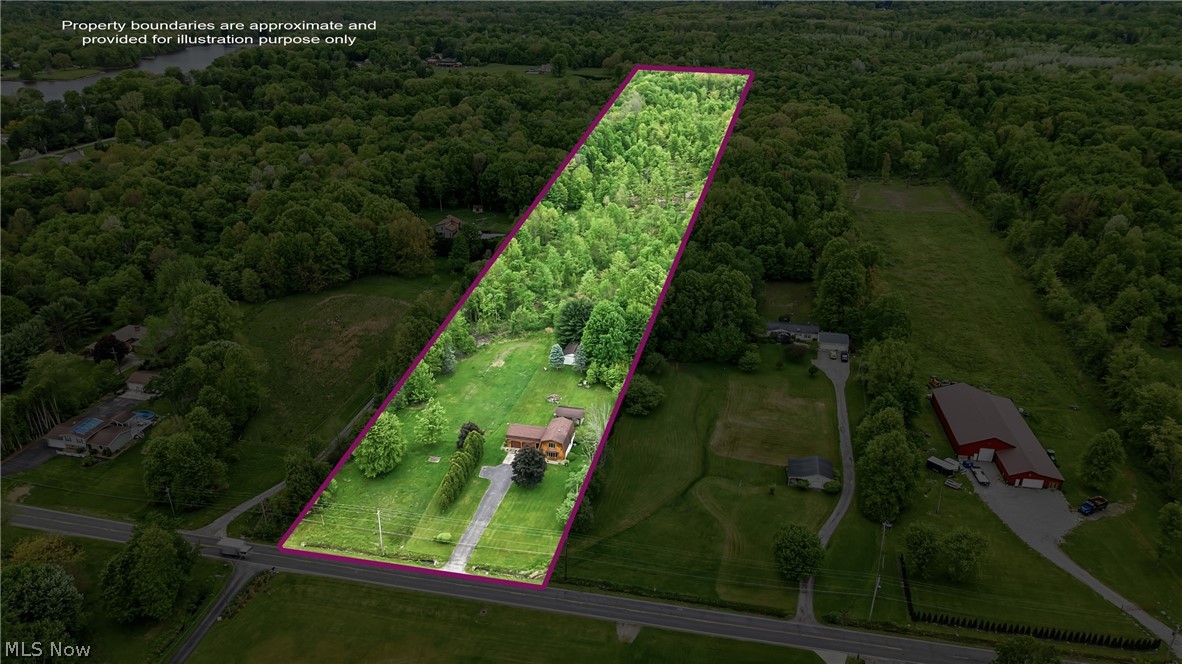 6667 Chestnut-Ridge Road Hubbard, OH 44425 - Photo 4 of 35 Aerial overview showcasing a property with extensive wooded acreage and a long, private driveway
