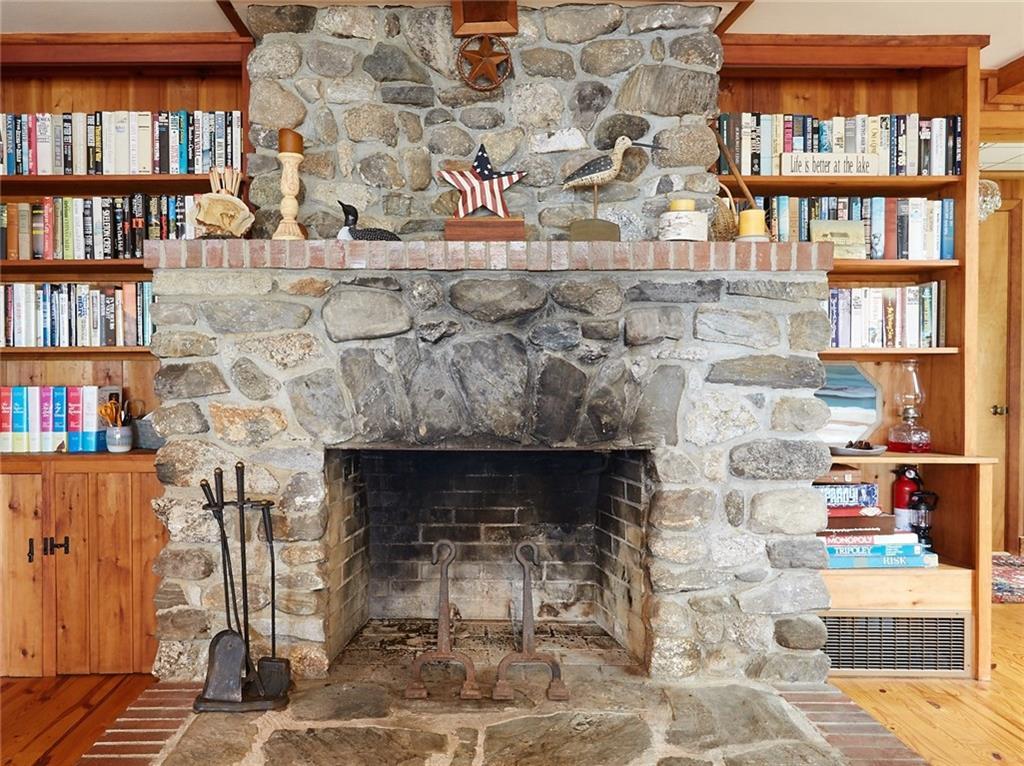 85 Deep Acres Shore Road Jefferson, ME 04348 - Photo 10 of 34 Fieldstone fireplace makes a...