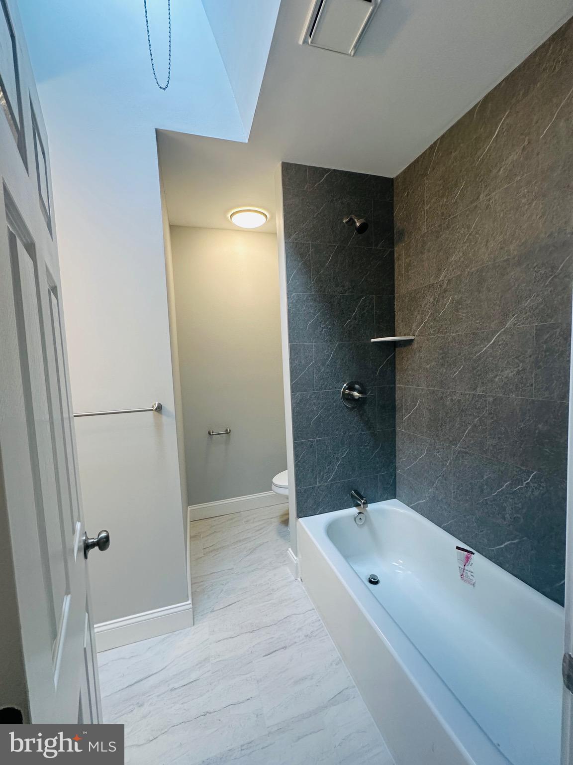 3451 Cottman Avenue Philadelphia, PA 19149 - Photo 13 of 18 a bathroom with a tub and a shower