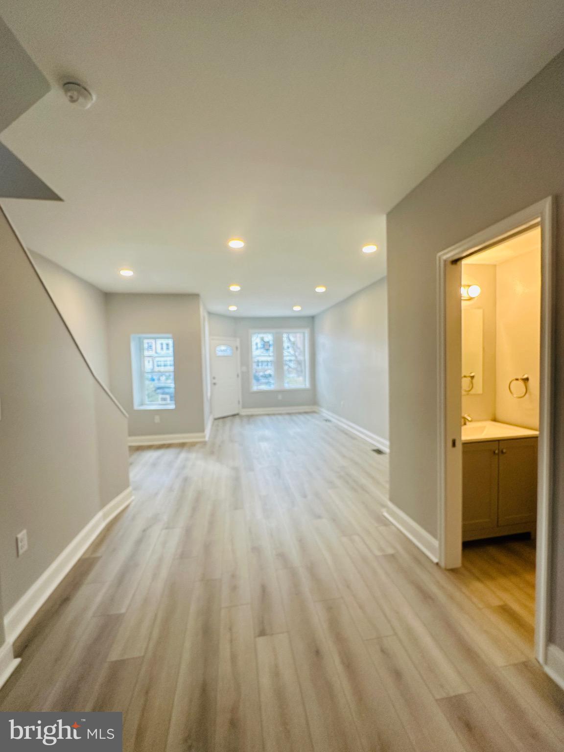 3451 Cottman Avenue Philadelphia, PA 19149 - Photo 4 of 18 a view of a big room with wooden floor and windows