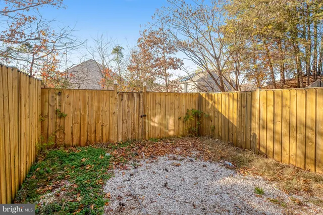 a view of a building with a yard