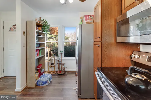 a room with furniture and a book shelf