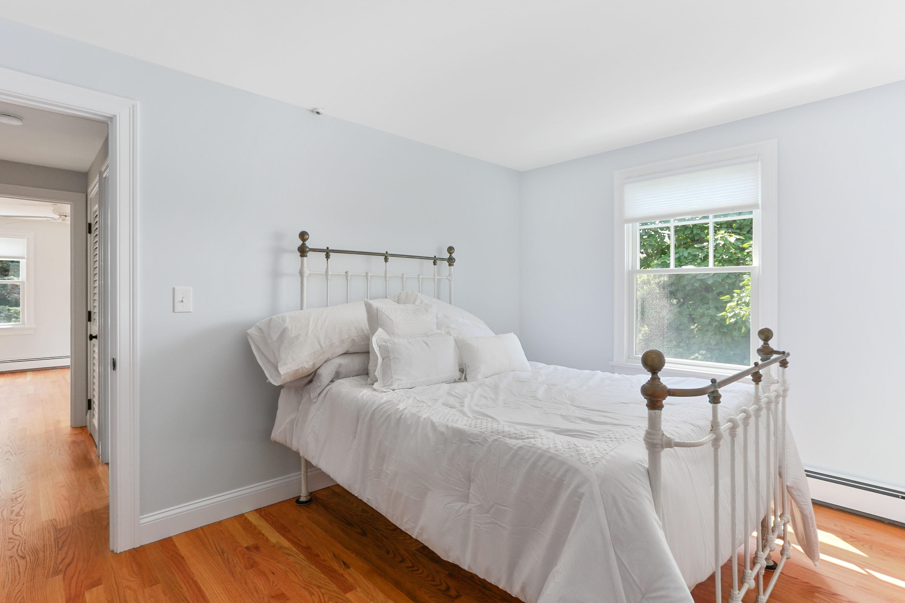 225 Goody Hallet Drive Eastham, MA 02642 - Photo 26 of 45 a bedroom with bed and window