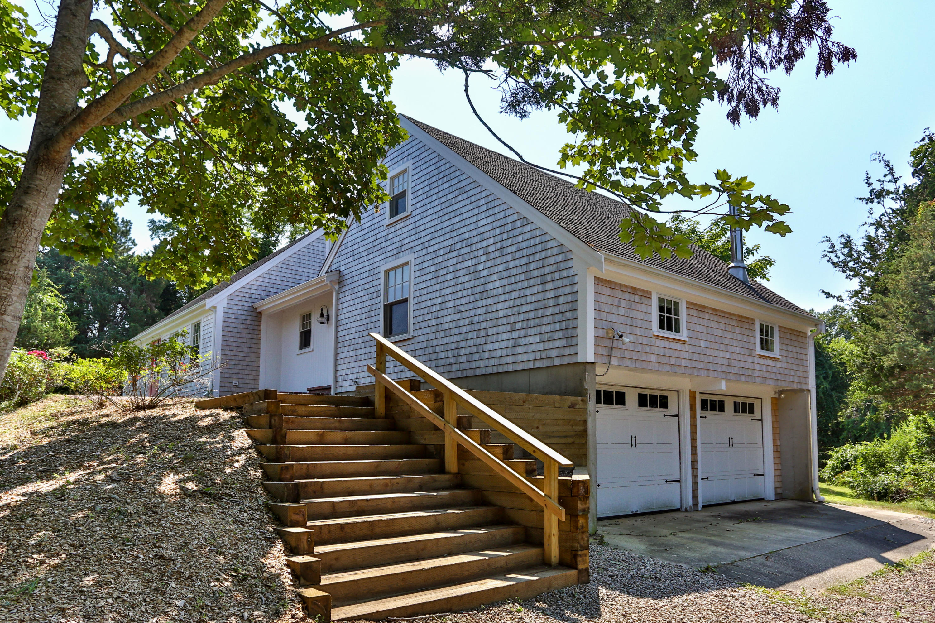 225 Goody Hallet Drive Eastham, MA 02642 - Photo 6 of 45 a view of house with a tree