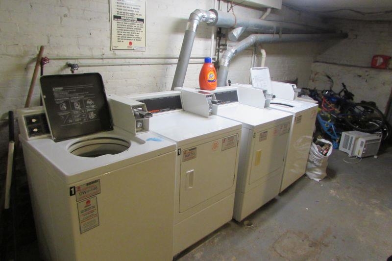 233 Griffith Street, Unit 2E Jersey City, NJ 07307 - Photo 11 of 12 a utility room with dryer and washer