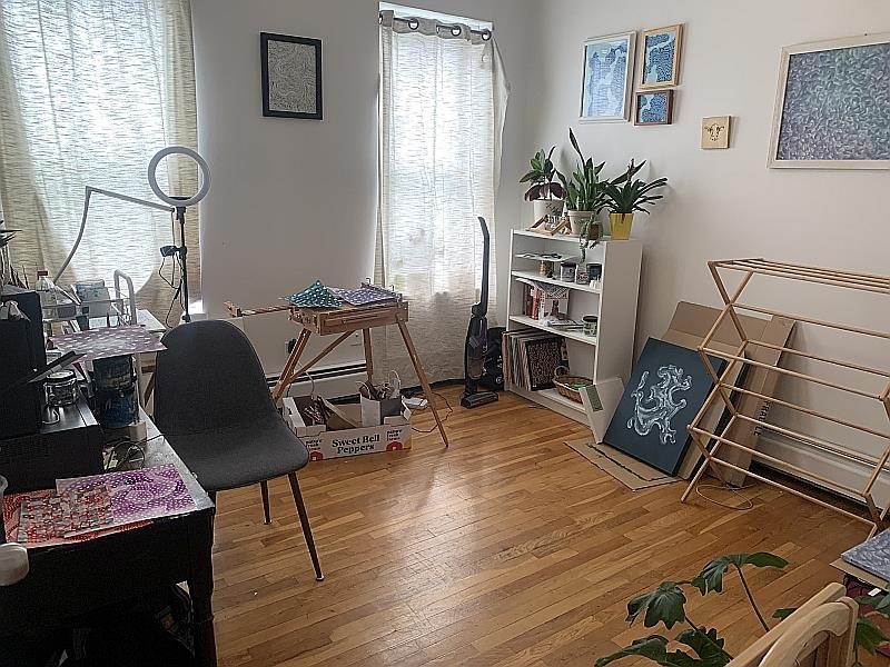 233 Griffith Street, Unit 2E Jersey City, NJ 07307 - Photo 6 of 12 a workspace with furniture and window