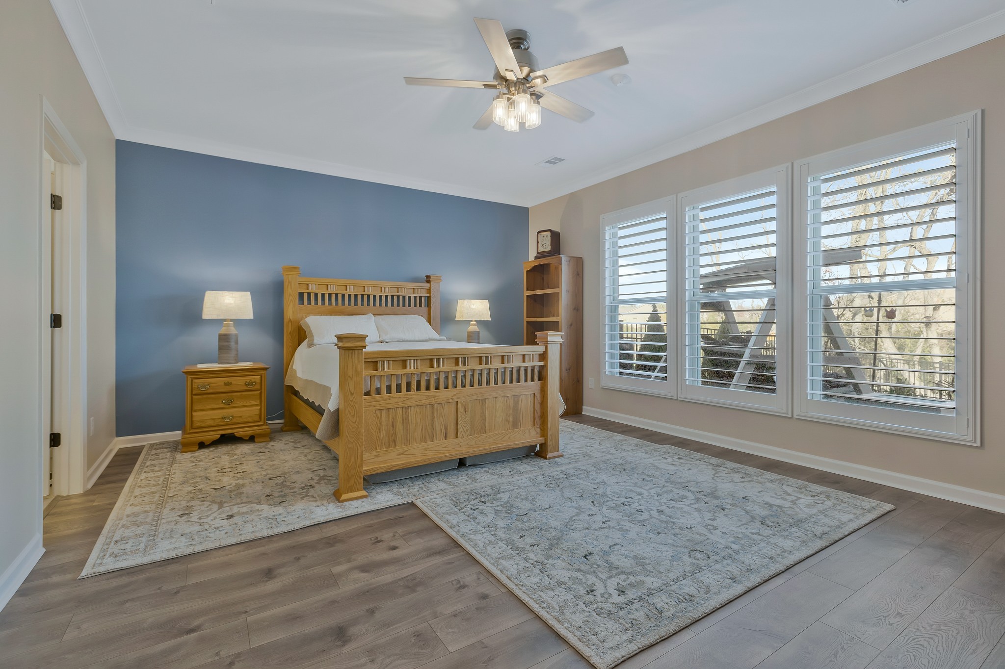 2132 Loudon Hill Spring Hill, TN 37174 - Photo 22 of 54 a bedroom with a bed and a chandelier