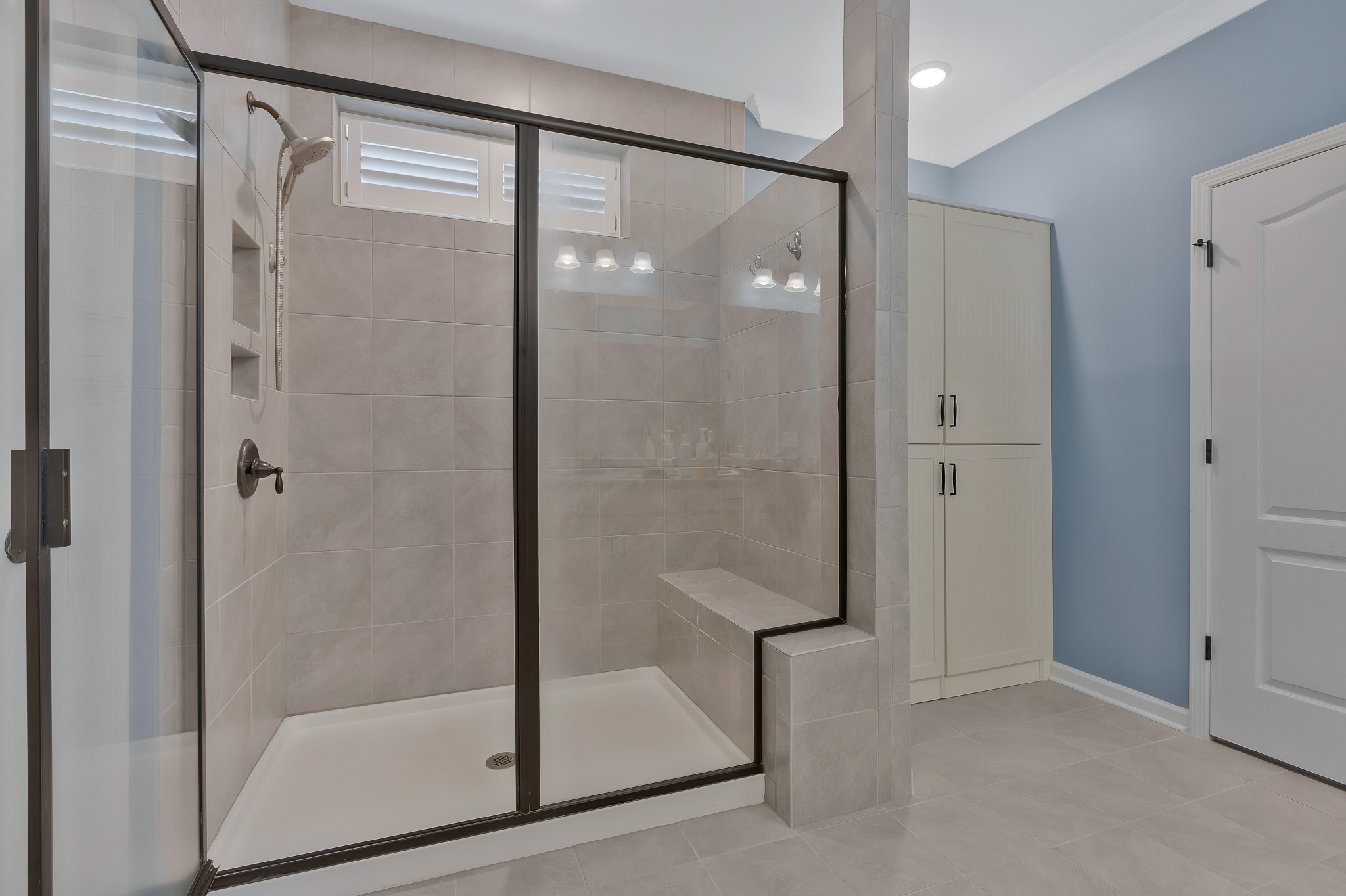2132 Loudon Hill Spring Hill, TN 37174 - Photo 26 of 54 a bathroom with a glass shower door