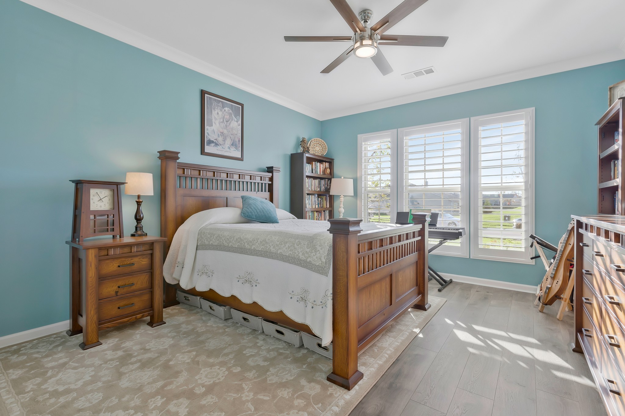 2132 Loudon Hill Spring Hill, TN 37174 - Photo 27 of 54 a bedroom with a bed and a chandelier