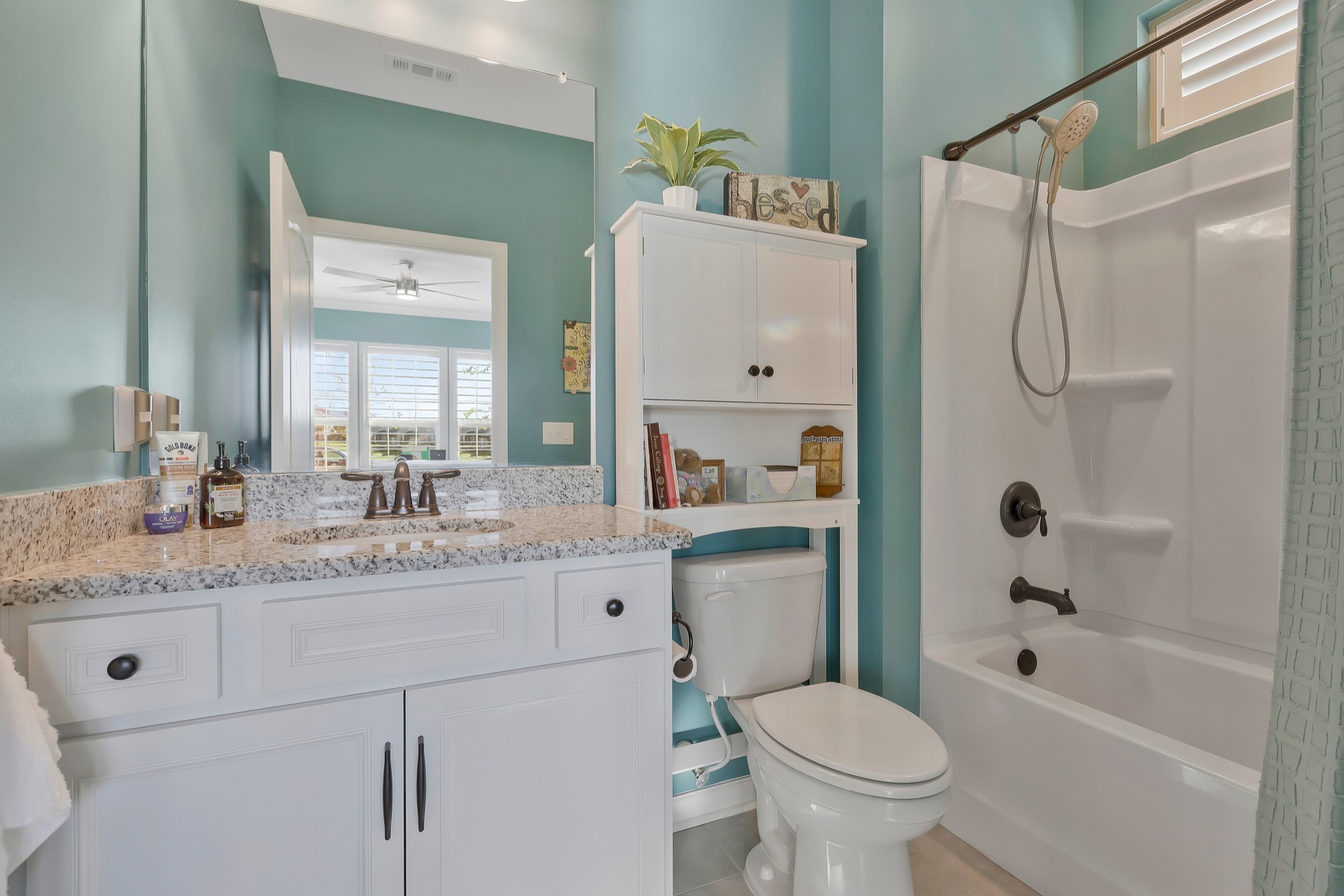 2132 Loudon Hill Spring Hill, TN 37174 - Photo 28 of 54 a bathroom with a granite countertop sink toilet and shower