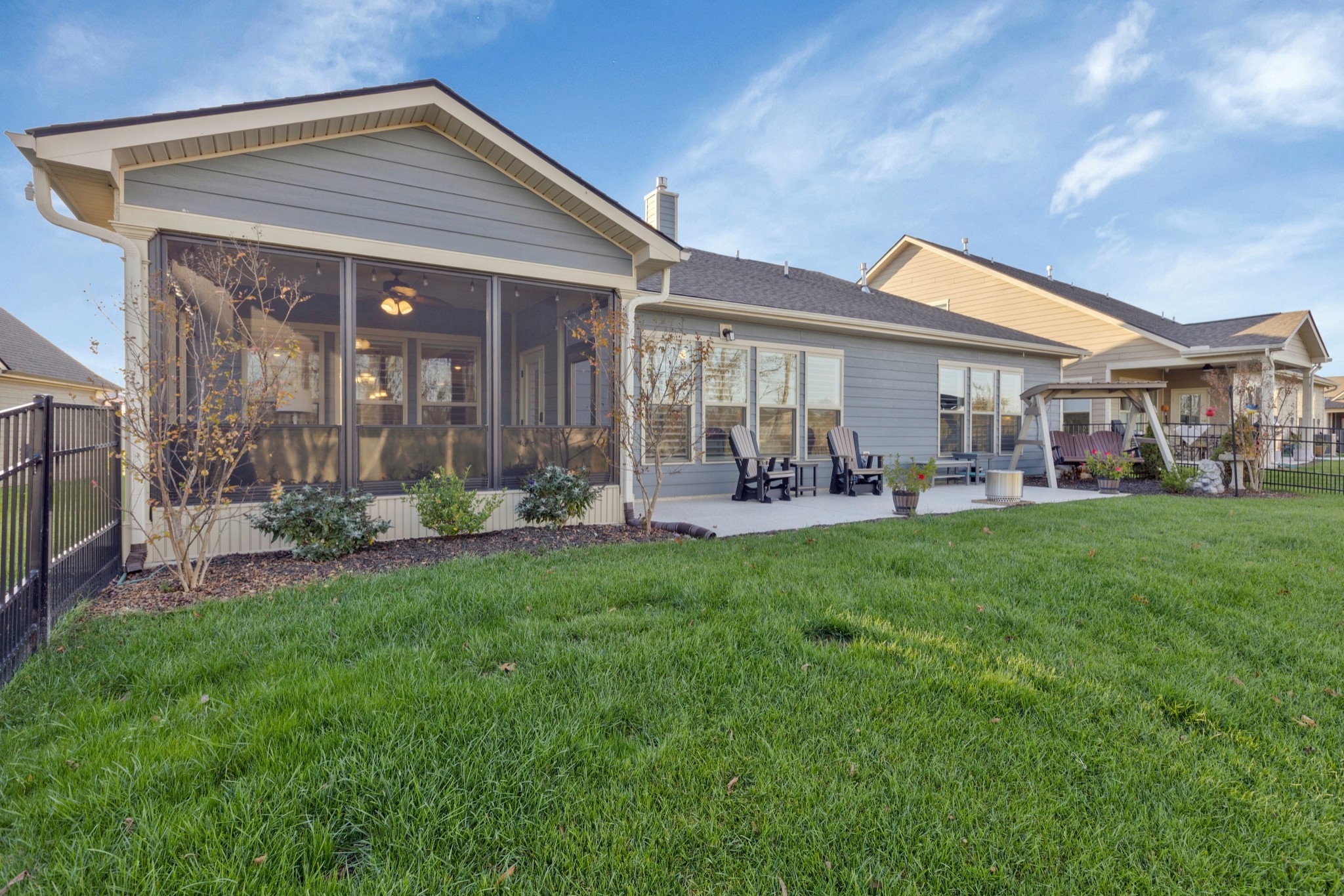 2132 Loudon Hill Spring Hill, TN 37174 - Photo 36 of 54 a front view of a house with a yard and outdoor seating