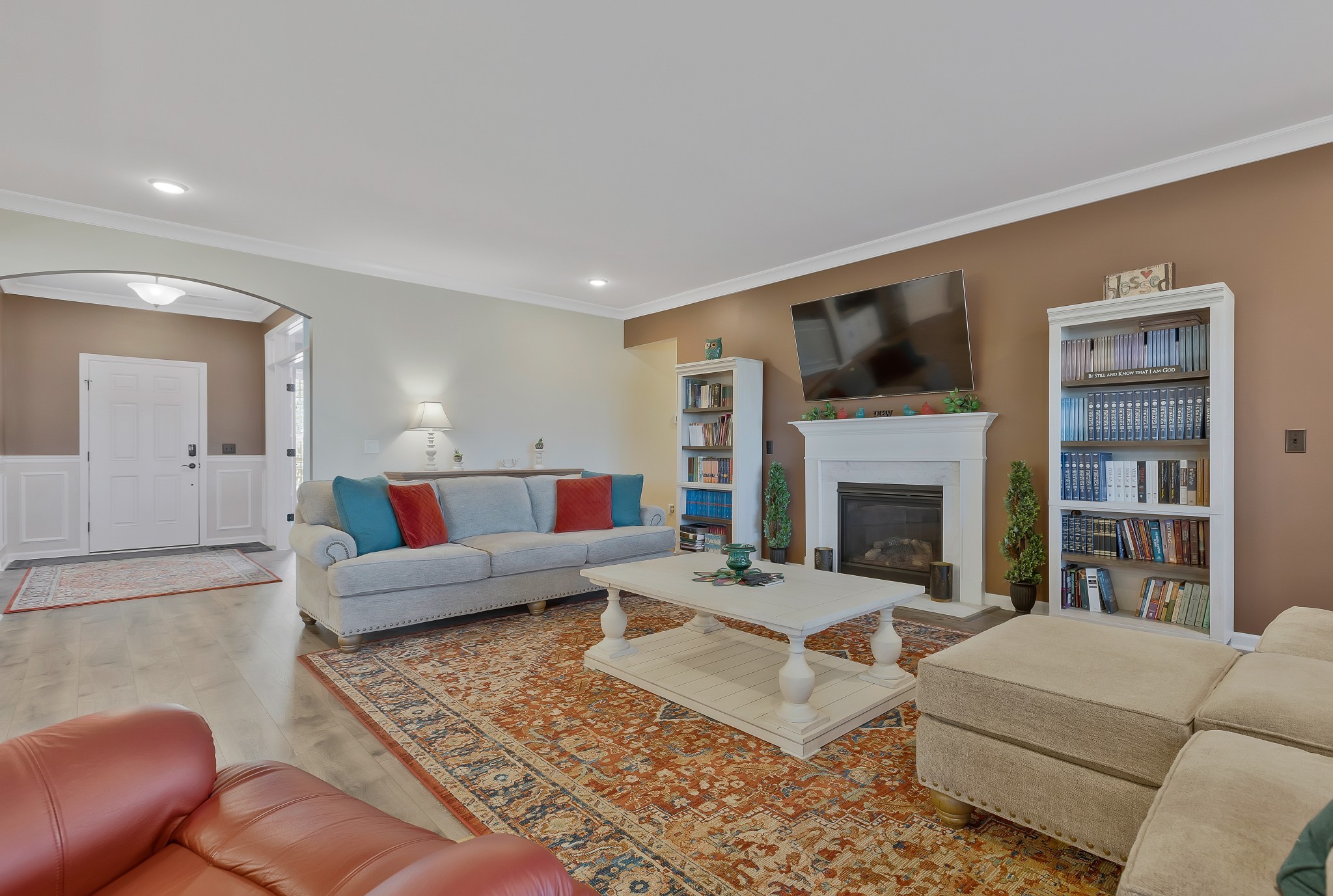 2132 Loudon Hill Spring Hill, TN 37174 - Photo 8 of 54 a living room with furniture fireplace and a flat screen tv