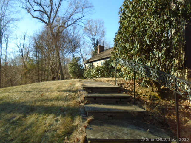 11 Timbercrest Drive Canton, CT 06019 - Photo 14 of 39 a view of backyard with wooden fence