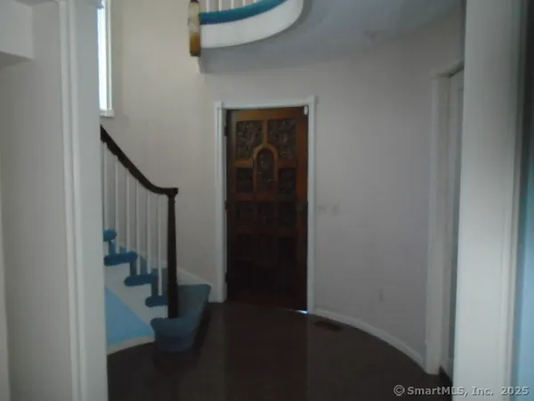 a view of hallway with stairs