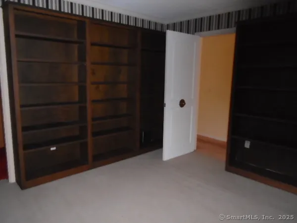 a view of an empty walk in closet