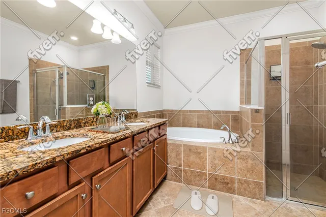 a bathroom with a granite countertop sink a large mirror and a bathtub with shower