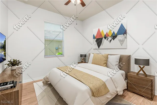 a bedroom with a bed dresser and window