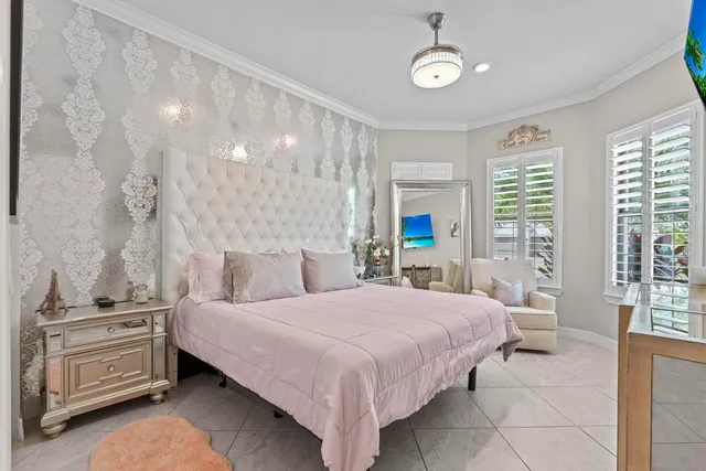 a bedroom with a bed and a cabinets