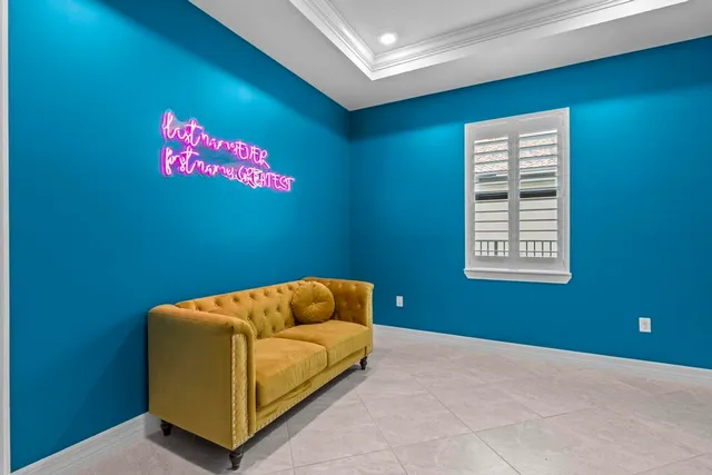 a room with a bed and a window