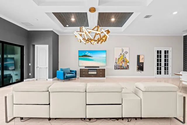 a living room with furniture and window