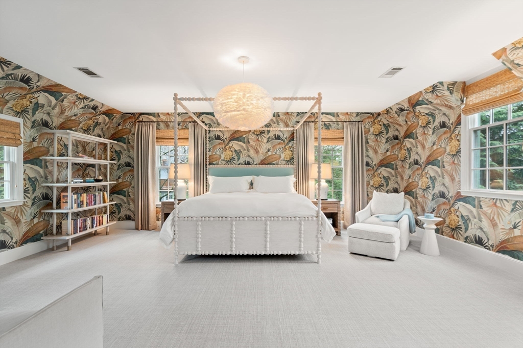 48 Scotch Pine Road Wellesley, MA 02481 - Photo 22 of 39 a spacious bedroom with a bed couch and a large window