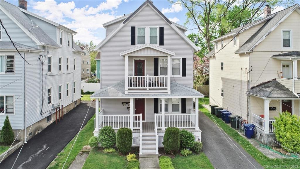 520 Midland Street Bridgeport, CT 06605 - Photo 1 of 1 a front view of a house with a yard