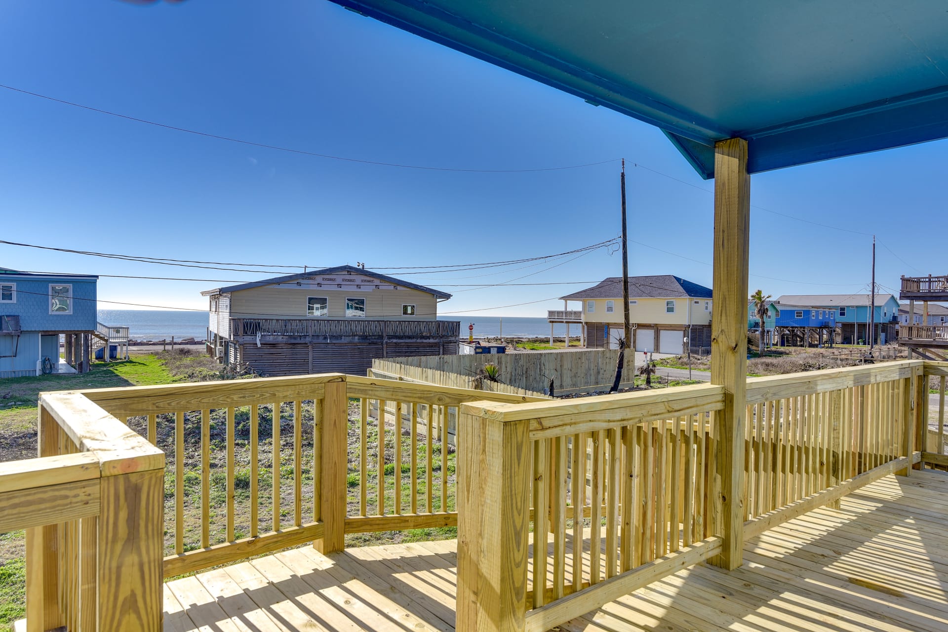 415 Seashell Drive Surfside Beach, TX 77541 - Photo 3 of 10 Deck featuring a residential view