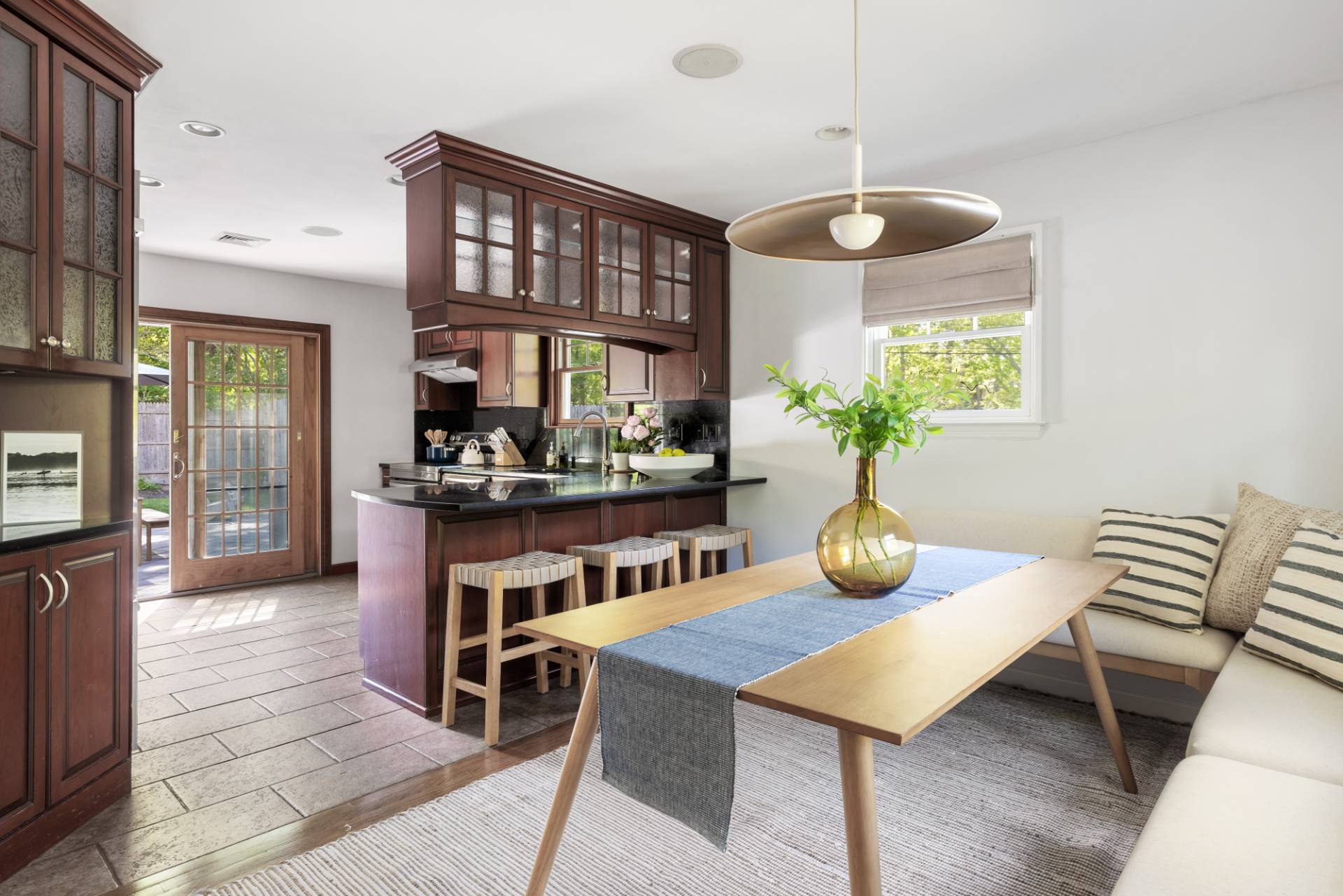 40 Ridge Road West Sag Harbor, NY 11963 - Photo 6 of 27 a dining room with furniture and wooden floor