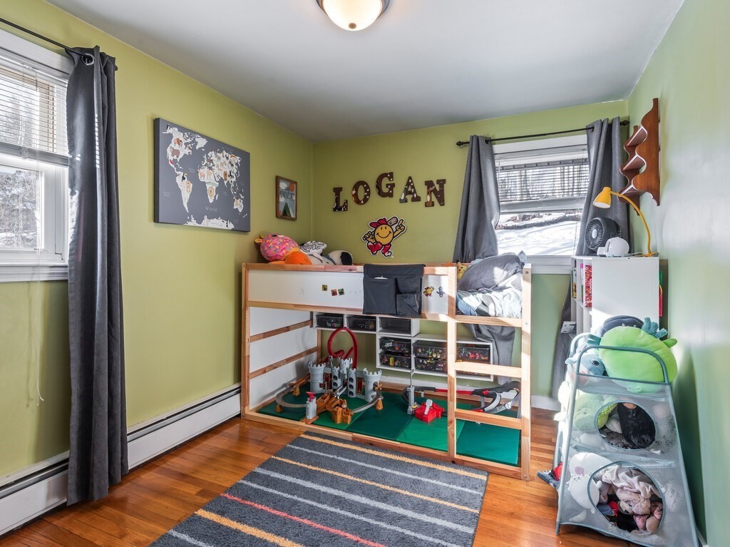 248 St Nicholas Avenue Worcester, MA 01606 - Photo 19 of 30 a bed room with a bed and a window