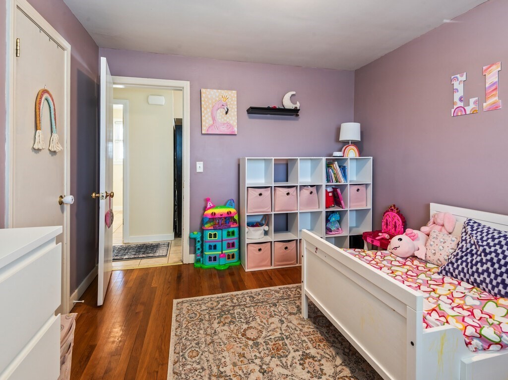 248 St Nicholas Avenue Worcester, MA 01606 - Photo 23 of 30 a bed room with a bed and a dresser