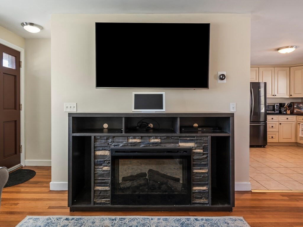 248 St Nicholas Avenue Worcester, MA 01606 - Photo 5 of 30 a stove top oven sitting inside of a kitchen