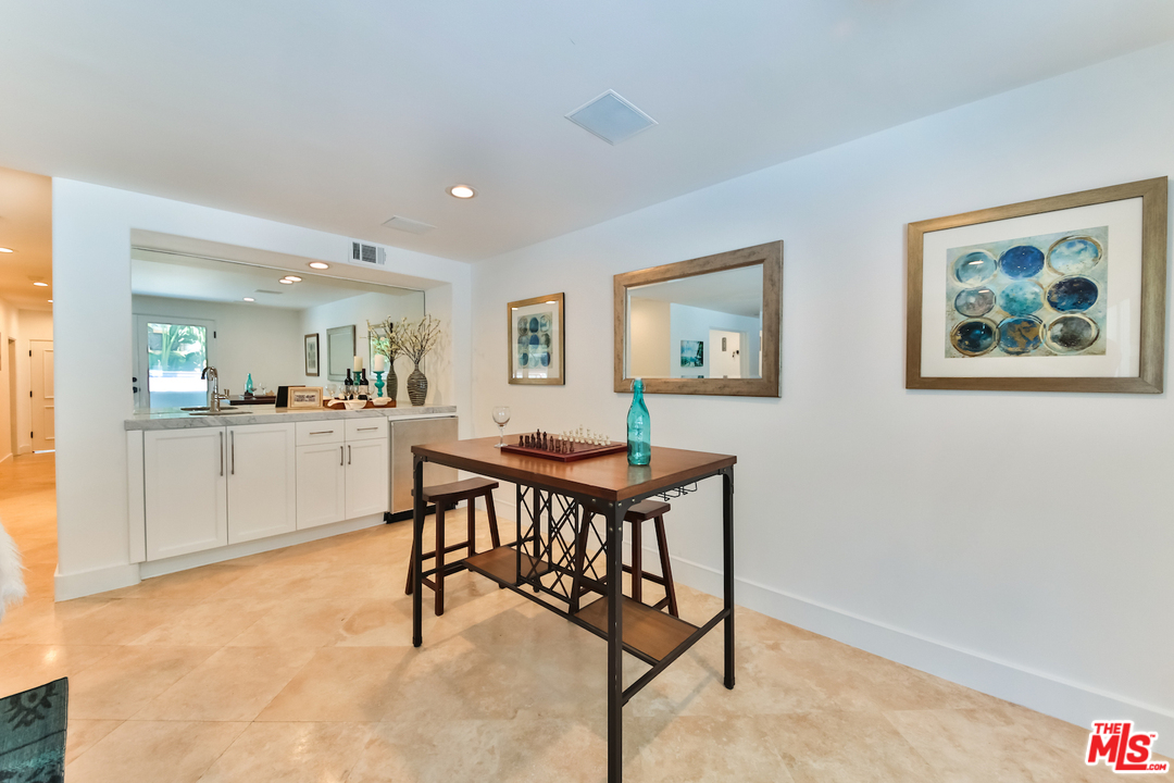 124 Reef Mall Marina del Rey, CA 90292 - Photo 28 of 44 a view of a dining room with furniture and a livingroom