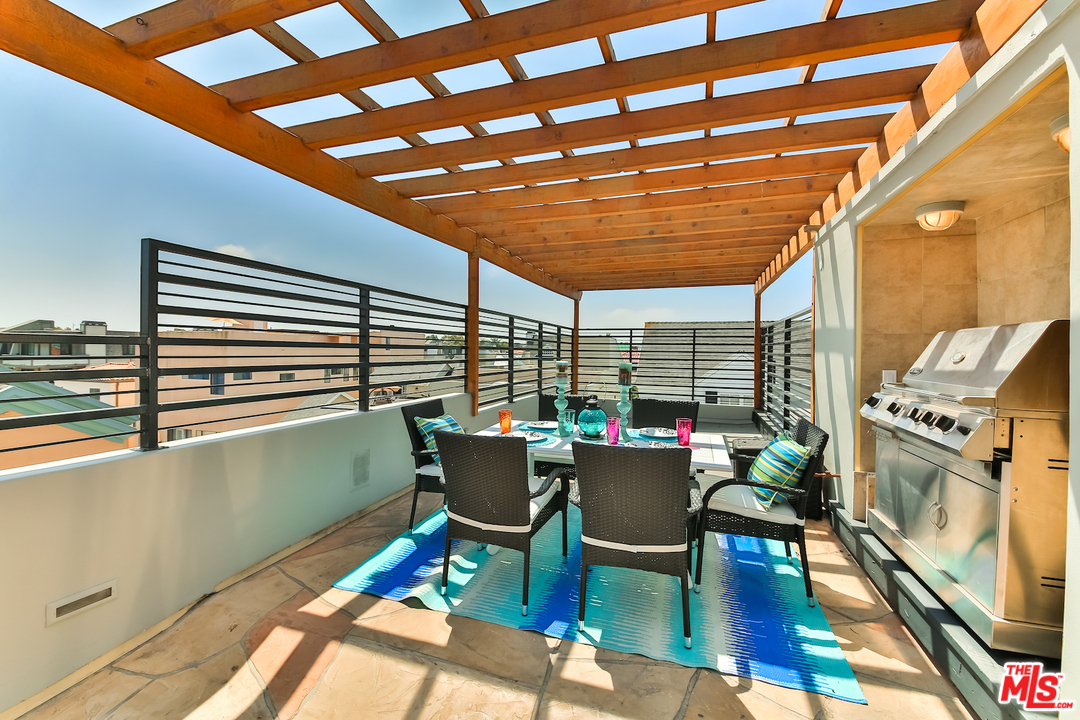 124 Reef Mall Marina del Rey, CA 90292 - Photo 37 of 44 a view of a dining room with furniture window and outside view