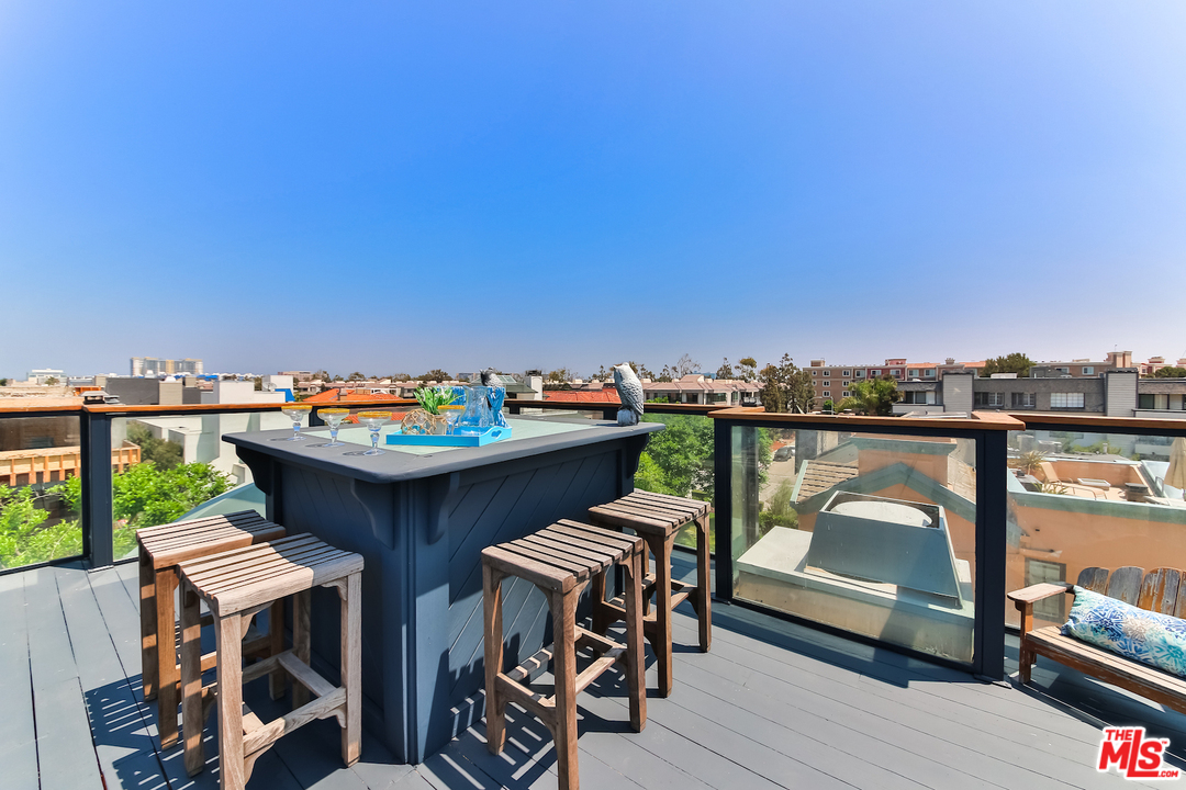 124 Reef Mall Marina del Rey, CA 90292 - Photo 38 of 44 a view of a chairs and table on the terrace