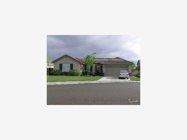 1434 Natalie Court Ripon, CA 95366 - Photo 1 of 1 a picture of a person on a street