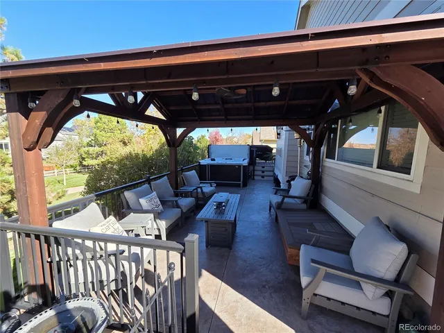 a view of porch with chairs and wooden floor