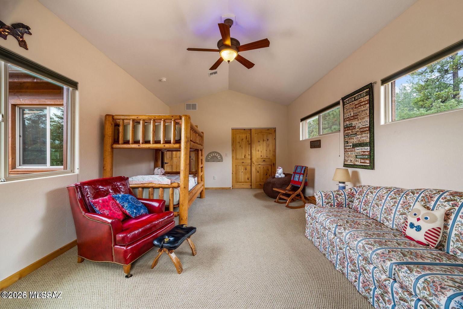 17 2195 Alpine, AZ 85920 - Photo 7 of 48 a living room with furniture and a flat screen tv